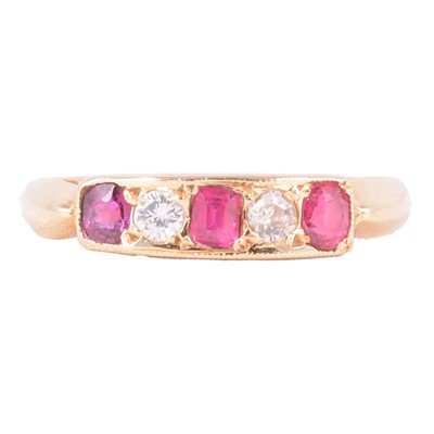 Lot 10 - A ruby and diamond five stone ring.