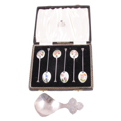 Lot 151 - A set of silver and enamel coffee spoons, modern caddy spoon.