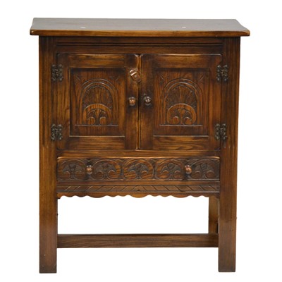 Lot 305 - Reproduction carved oak side cabinet