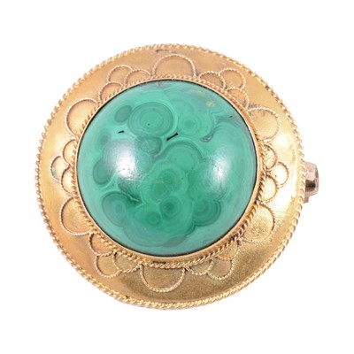 Lot 196 - A malachite brooch with etruscan style border.