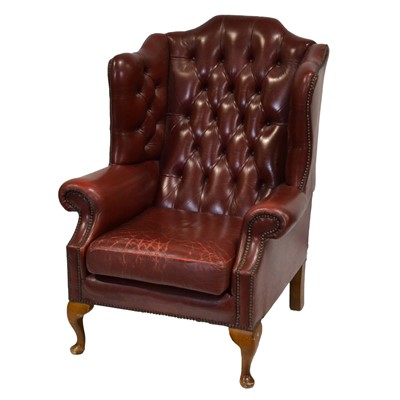 Lot 349 - Modern buttoned leather wing back chair