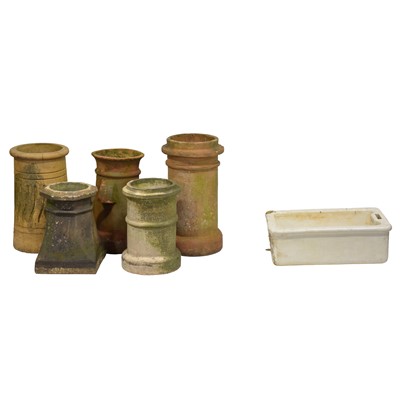 Lot 438 - Five terracotta chimney pots; a Belfast sink; and four falcon posts