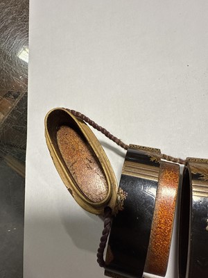 Lot 159 - Two Japanese lacquered five-section inro