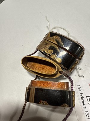 Lot 159 - Two Japanese lacquered five-section inro