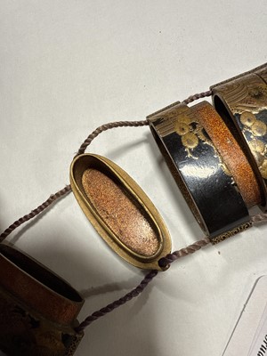 Lot 159 - Two Japanese lacquered five-section inro