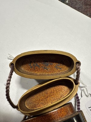 Lot 159 - Two Japanese lacquered five-section inro