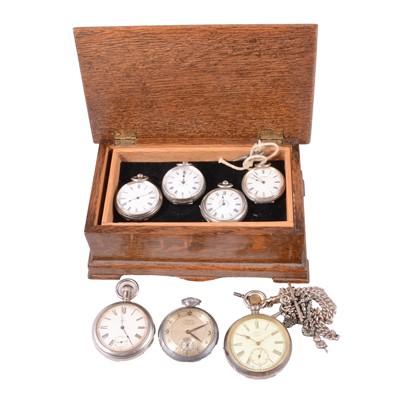 Lot 1091 - An oak casket containing three pocket watches, four fob watches and two Albert watch chains.