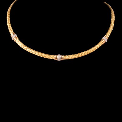 Lot 348 - A yellow and white metal modern diamond set collar necklace.