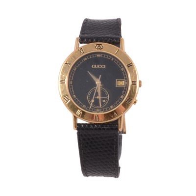 Lot 1046 - Gucci - a 3800M chronograph gold-plated quartz wristwatch.