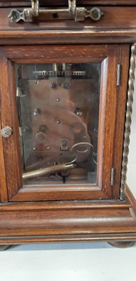 Lot 102 - Continental walnut musical mantel clock, "Harmonie Symphonion"