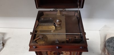 Lot 102 - Continental walnut musical mantel clock, "Harmonie Symphonion"