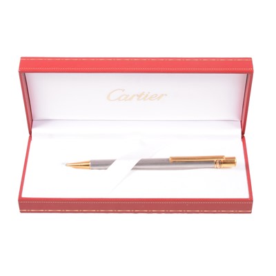 Lot 1122 - must de Cartier - a ball point pen, boxed