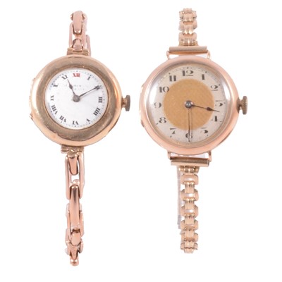 Lot 1023 - Two lady's vintage gold wrist watches.