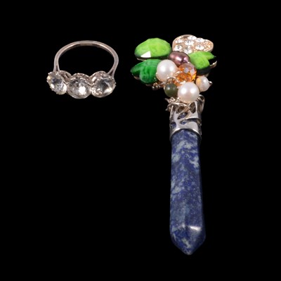 Lot 428 - Pauline Wong - a contemporary brooch, and a three stone ring.