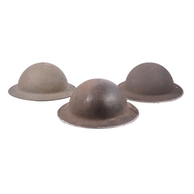 Lot 273 - Three British WWII steel helmets