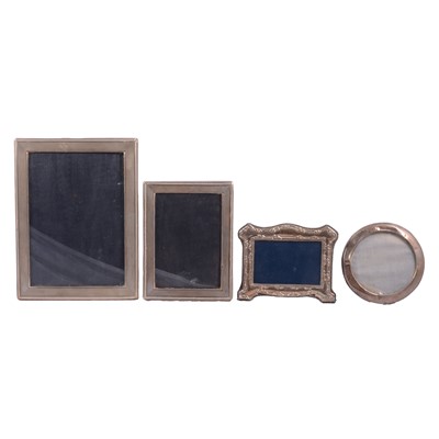 Lot 137 - Silver-mounted photograph frame, import marks for P H Vogel & Co, London 1975, and three others.