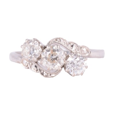 Lot 94 - A diamond three stone ring.