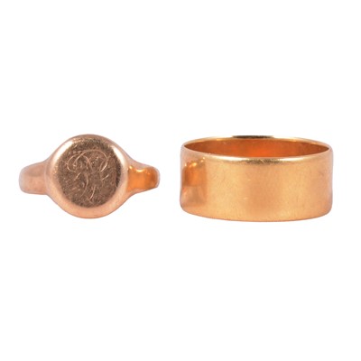 Lot 151 - An 18 carat yellow gold wedding band and a 9 carat yellow gold signet ring.