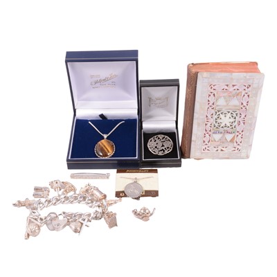 Lot 443 - A collection of silver and white metal jewellery, and a mother-of-pearl covered prayer book.