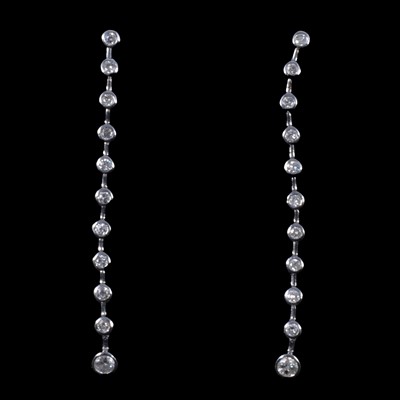 Lot 250 - A pair of diamond drop earrings.