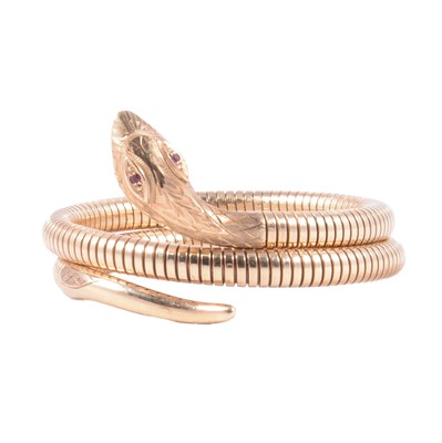 Lot 210 - A 9 carat yellow gold articulated snake bangle.