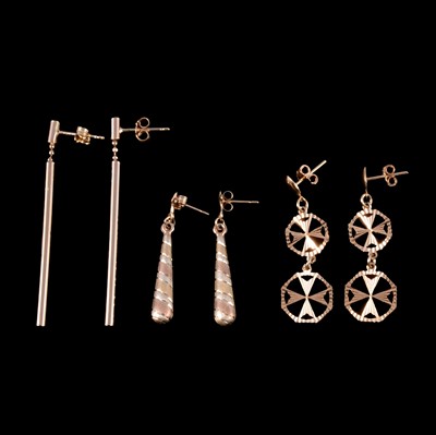 Lot 273 - Three pairs of gold / yellow metal earrings for pierced ears.