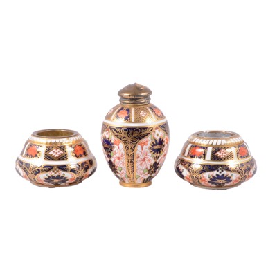 Lot 17 - Royal Crown Derby Imari silver gilt mounted jar and two table lighter bases