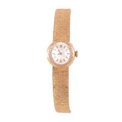 Lot 1014 - Certina – a lady’s yellow metal manual wind bracelet wristwatch.