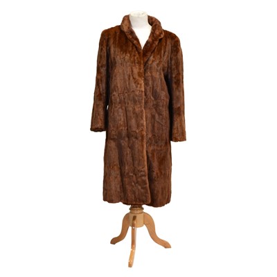 Lot 1232 - Two full length fur coats.