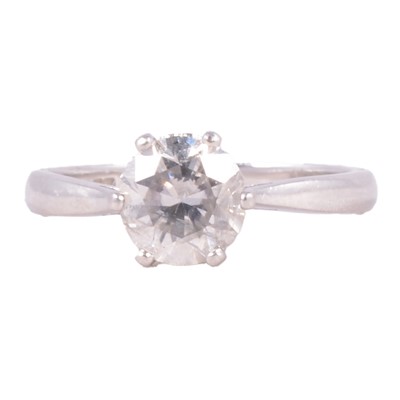 Lot 67 - A diamond solitaire ring.