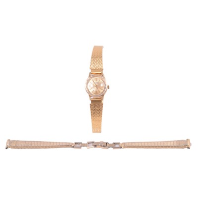 Lot 1021 - Silvana - a lady's vintage 14 carat yellow gold manual wind bracelet wristwatch, and a spare strap.