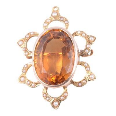 Lot 201 - A citrine and seed pearl brooch, and a garnet and opal ring.