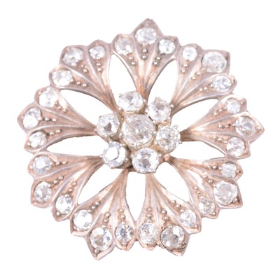 Lot 179 - A diamond floral brooch.