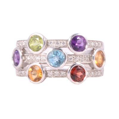 Lot 43 - A diamond and coloured stone bubble design ring.