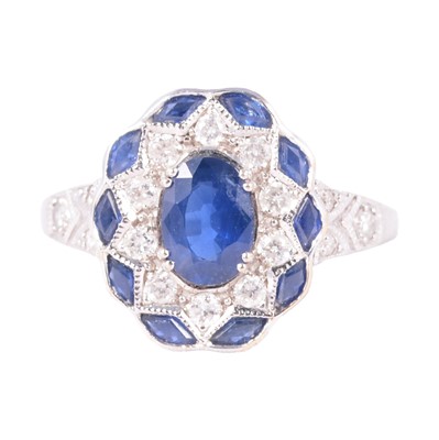 Lot 22 - An Art Deco style sapphire and diamond cluster ring.