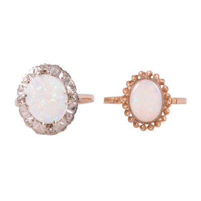 Lot 51 - Two opal dress rings.