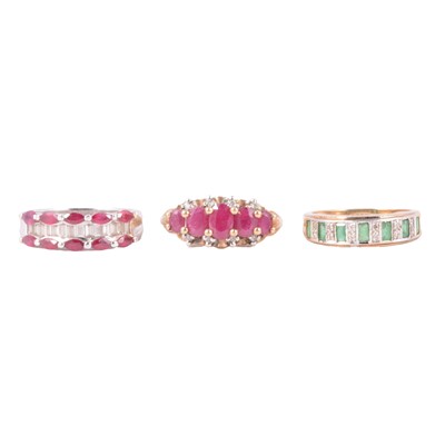 Lot 53 - Three gemset half hoop rings, ruby and diamond, emerald and diamond.