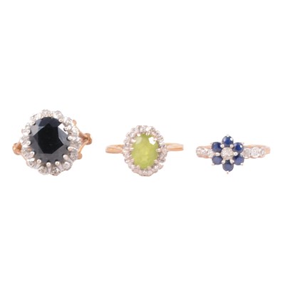 Lot 54 - Three gemset rings, sapphire and diamond, peridot and diamond.