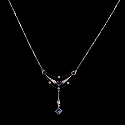 Lot 296 - A sapphire and diamond necklace.