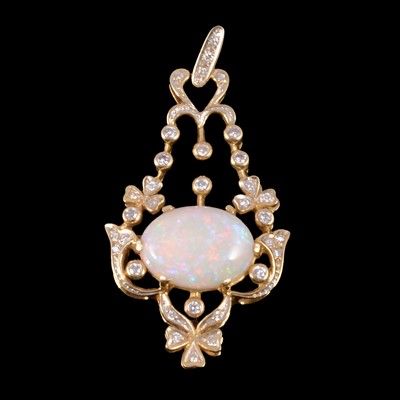 Lot 288 - An opal and diamond brooch pendant.