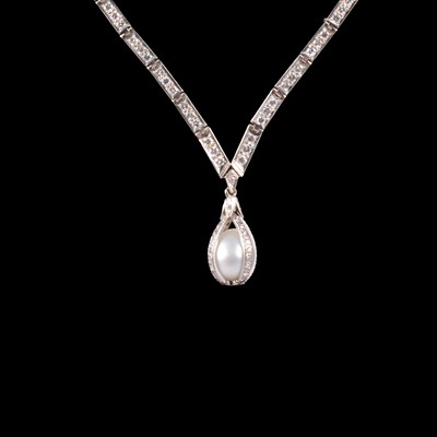 Lot 281 - A diamond necklace with pearl pendant drop.