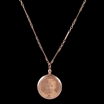 Lot 328 - A photo frame pendant on a chain.