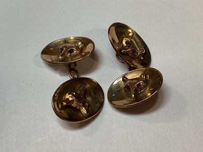 Lot 1106 - A pair of 9 carat yellow gold fox head cufflinks, bar brooch, stag's head lapel pin, and bracelet.