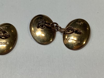 Lot 1106 - A pair of 9 carat yellow gold fox head cufflinks, bar brooch, stag's head lapel pin, and bracelet.