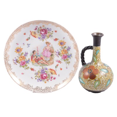 Lot 4 - Gouda pottery ewer and a French porcelain charger