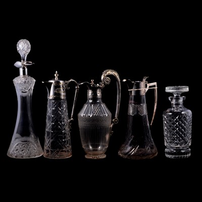 Lot 112 - Edwardian silver mounted claret jug, two other claret jugs and two decanters