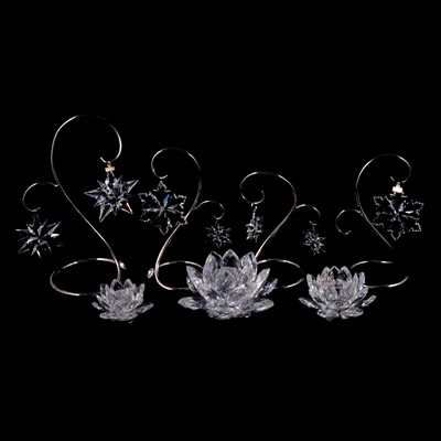 Lot 82 - Swarovski crystal; Three graduating candle holders, one boxed, together with Christmas ornaments.