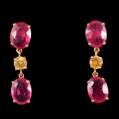 Lot 260 - A pair of synthetic ruby and yellow gemstone earrings.