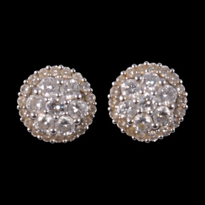 Lot 252 - A pair of diamond cluster earstuds.