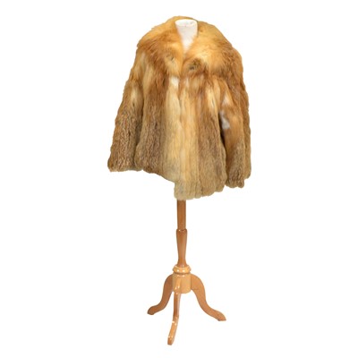 Lot 1225 - A red fox fur jacket by Sefton Marks of Solihull.